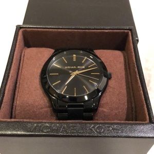 MICHAEL KORS BLACK AND GOLD WATCH